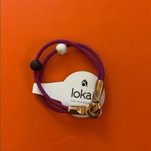 Lokai magenta bracelet with gold clasp never worn